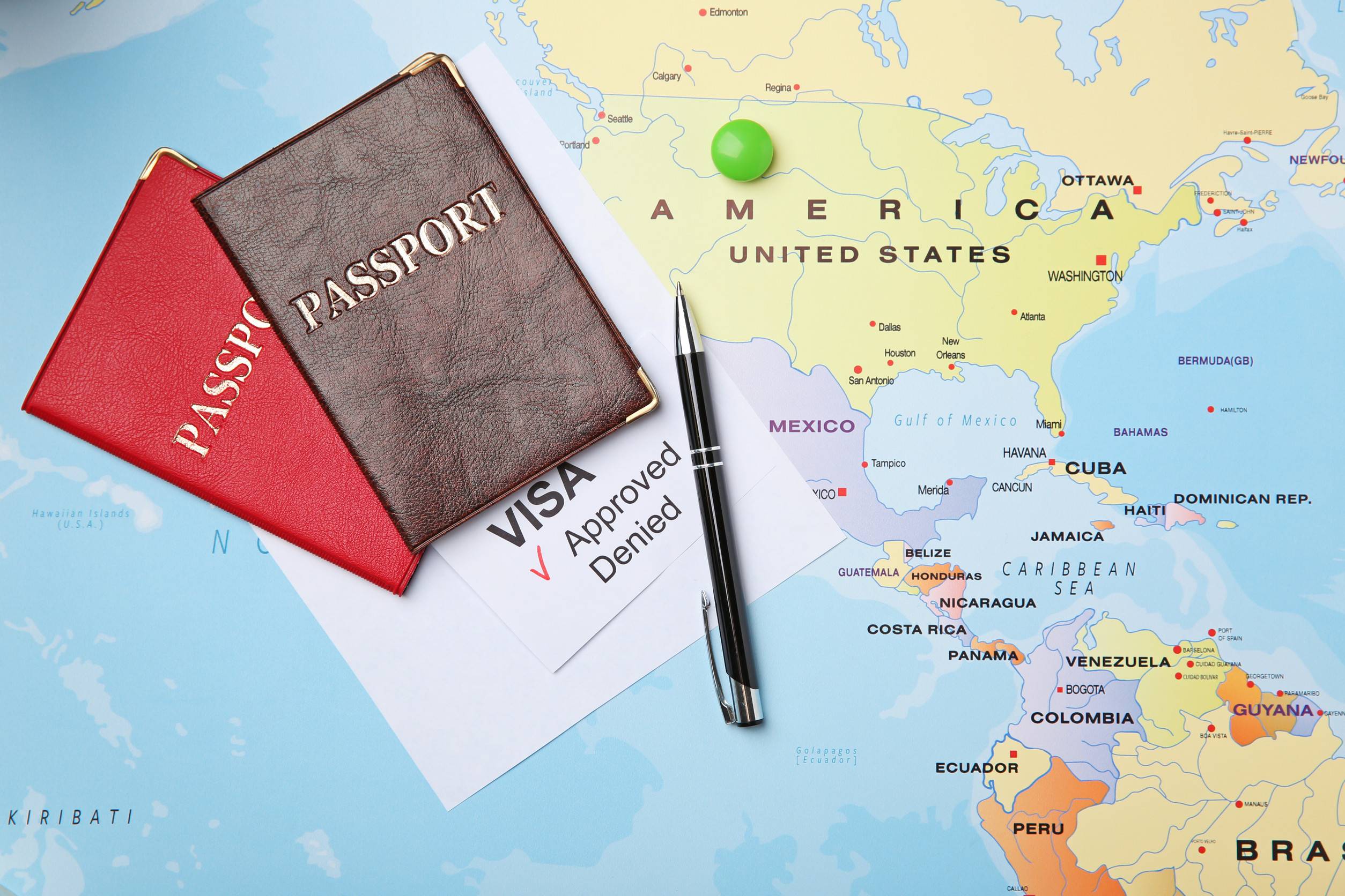 Passports and pen on map approved