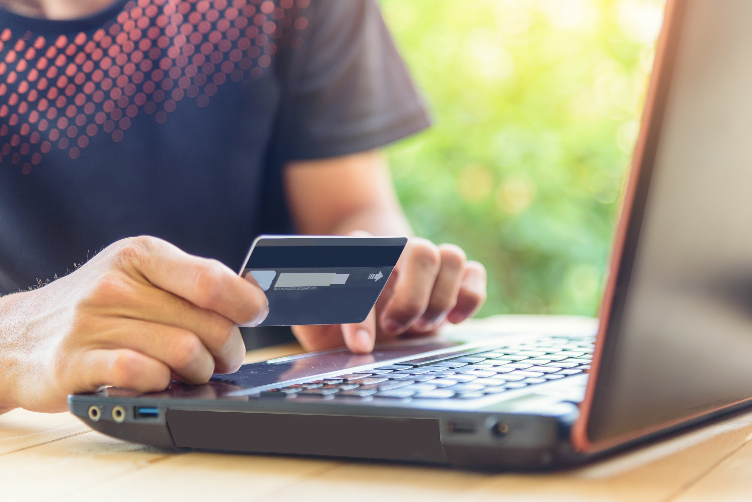 Person making online card payment