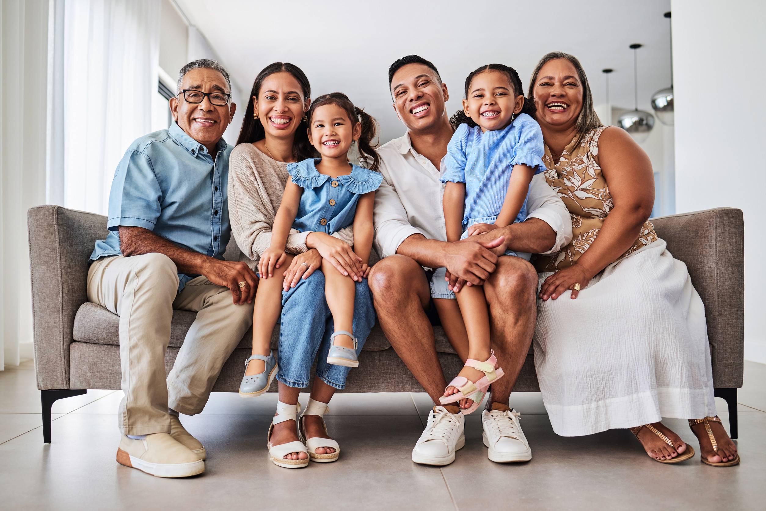Relax happy and portrait of big family on sofa for smile relationship and growth together