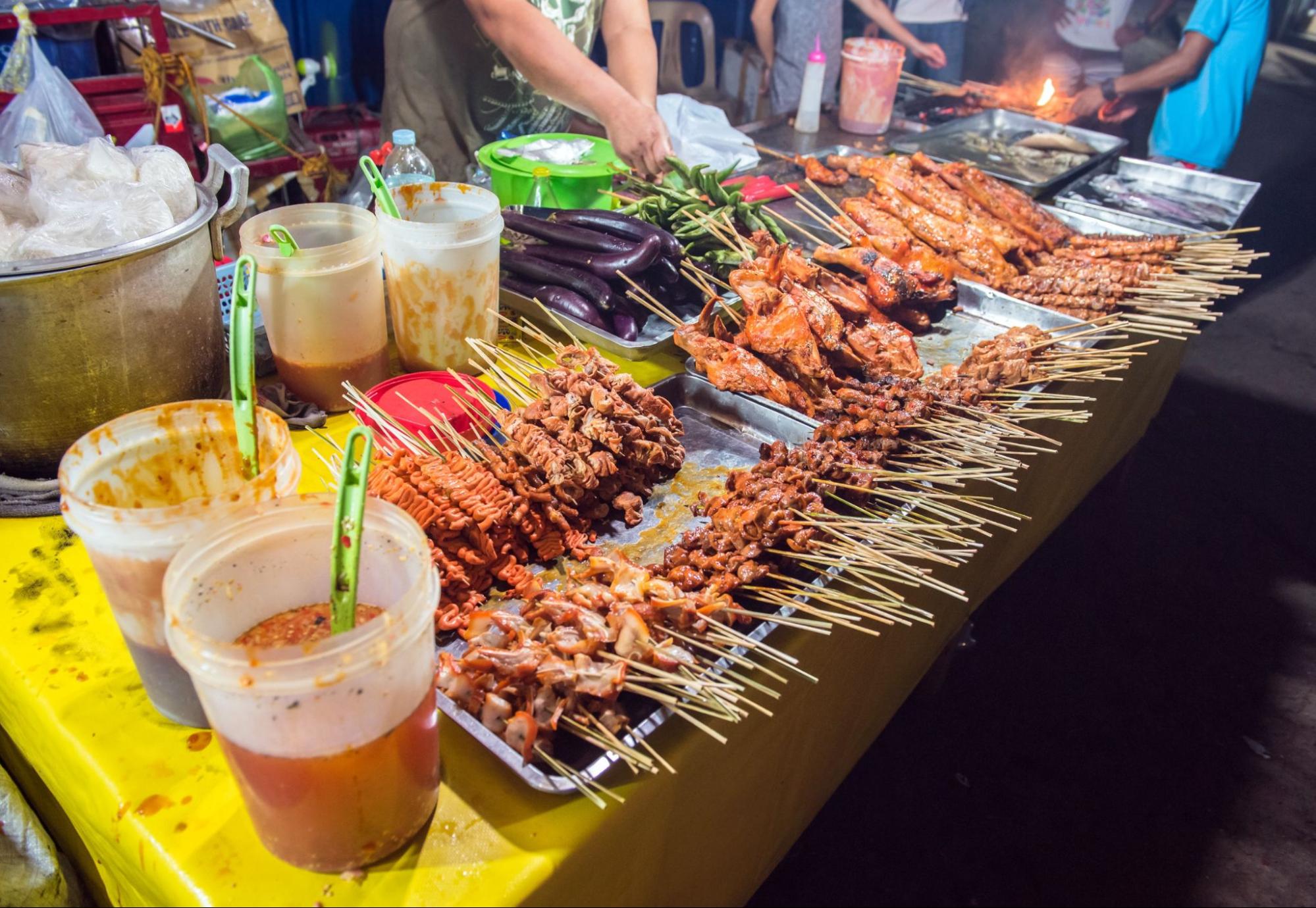 Traditional philippines street barbeque banquet at coron town busuanga island Traditional philippines street barbeque banquet at coron town busuanga island